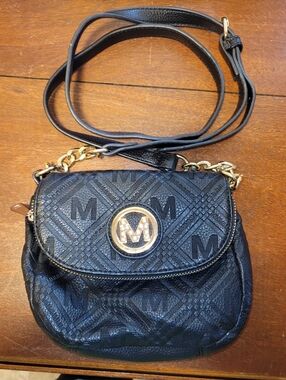 MKF Collection Black Quilted Crossbody Bag.